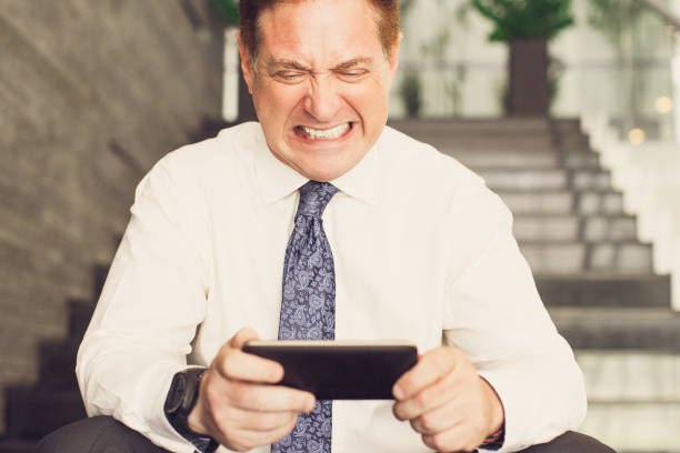 istock Furious businessman has received bad news_tone 826599642