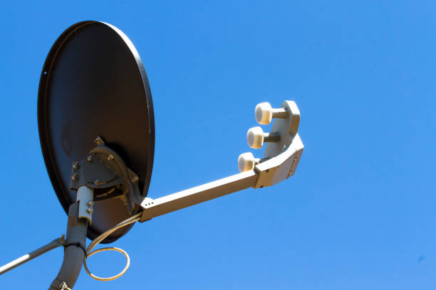 istock Satellite antenna on house roof 826606218