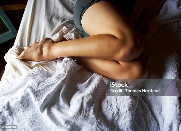 Overhead View Of Woman Laying On Bed Stock Photo - Download Image Now - Bed - Furniture, High Angle View, One Woman Only