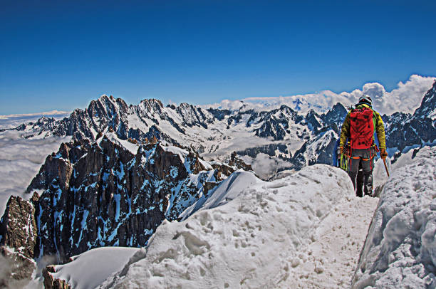 istock Climbers in french Alps Chamonix Mont Blanc. 826612914