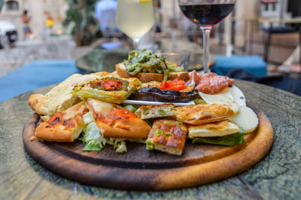 istock Italian appetizers and red wine 826617940