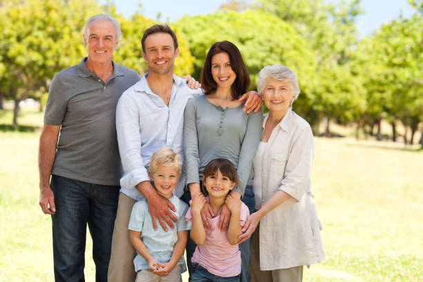 istock Family standing in the park 826627404