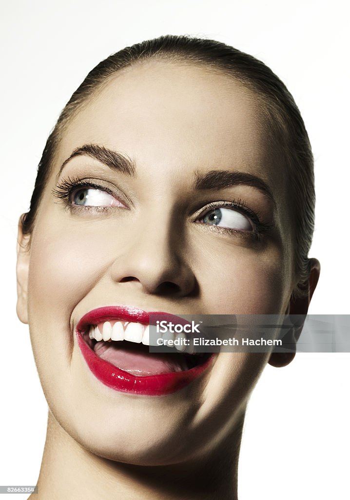 Girl smiling at someone off camera  Mouth Open Stock Photo