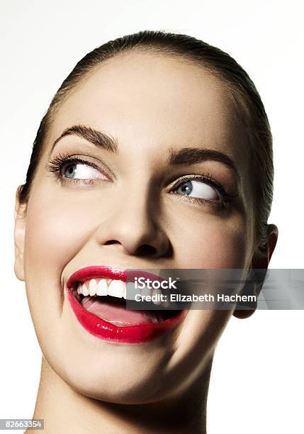 Girl Smiling At Someone Off Camera Stock Photo - Download Image Now - Mouth Open, 20-24 Years, Adults Only