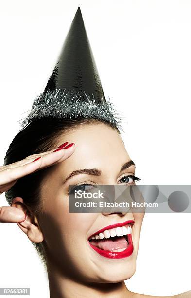 Niña Usando Sombrero De Cámara De Hacer Un Saludo Foto de stock y más banco de imágenes de Hacer el saludo militar - Hacer el saludo militar, Primer plano, 20-24 años