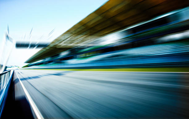 istock Racetrack in motion blur, racing sport background . 826634436