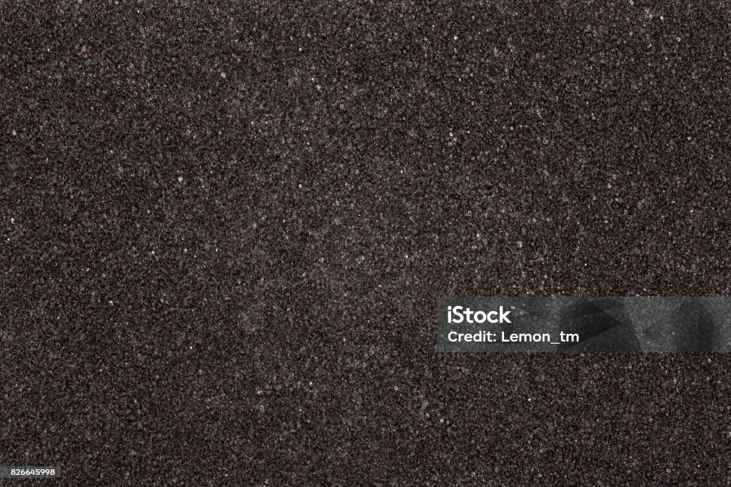 Tavola texture in schiuma nera. Sfondo in materiale in gomma morbida. - Foto stock royalty-free di Materiale gommoso