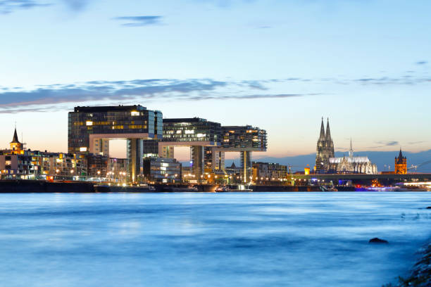 istock Cologne Cathedral and Crane Buildings at night 826646064
