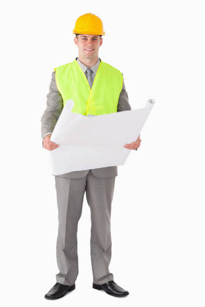 istock Portrait of a smiling architect looking a plan 826667846