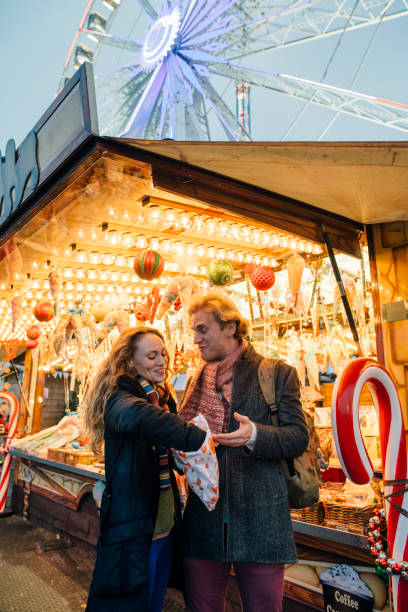 istock Enjoying Sweets From Winter Market 826668470