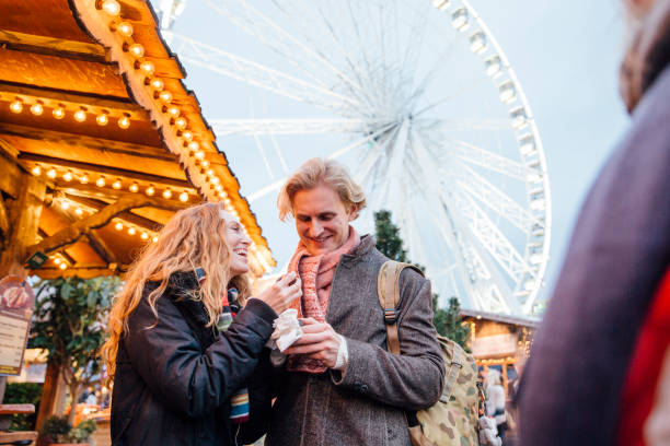 istock Eating Sweets At Winter Market 826668538