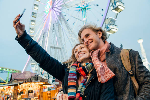 istock Christmas Amusement Park Selfie 826668596