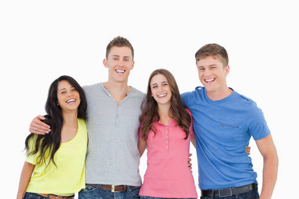 istock A laughing group of friends look at the camera 826669598