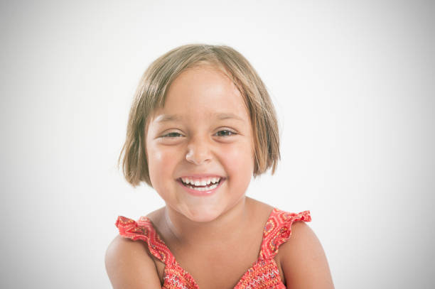 istock Little girl laughing 826682778