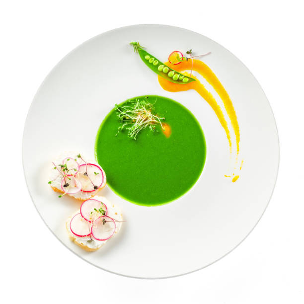 istock Pea cream soup in a rim soup plate 826690146
