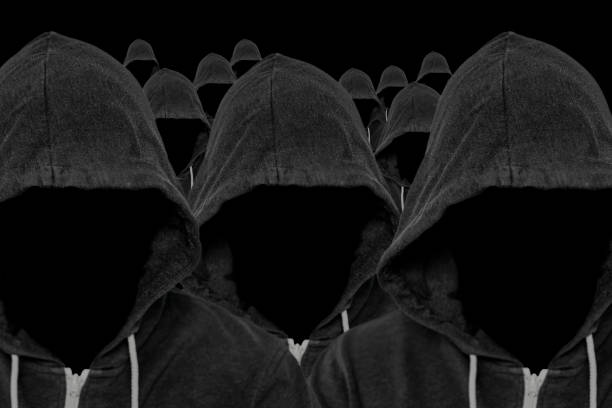 istock Hooded Mass of Anonymous Computer Hackers 826690676
