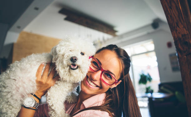 istock Image of young girl with her dog 826695316