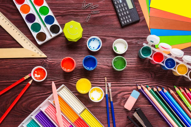 istock School supplies on a red background 826695334