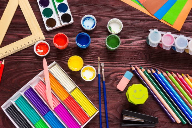 istock School supplies on a red background 826695346
