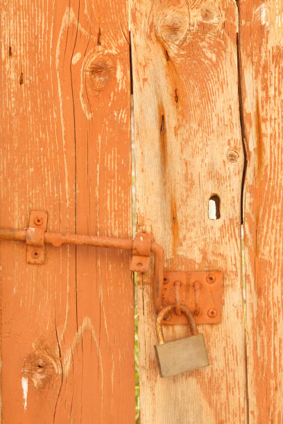istock Old door with lock, Old wood texture, Brown background 826712040