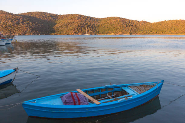 fishing boat during sunset at gulluk bodrum mugla turkey