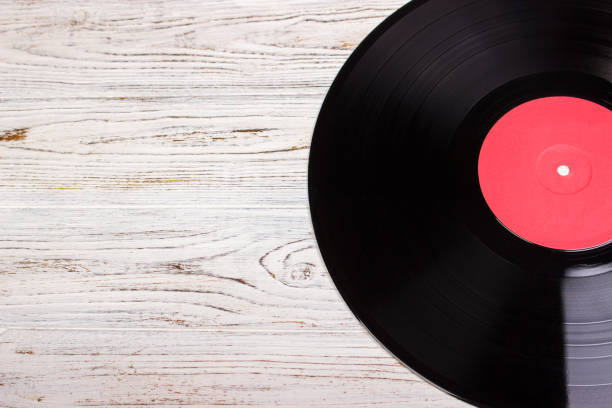 istock vinyl record in wood background, vinyl disc 826723144