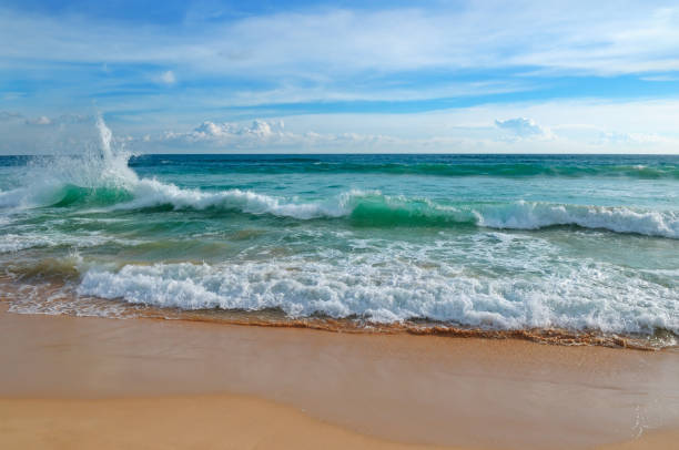 istock Tropical ocean, high waves and blue sky 826732398