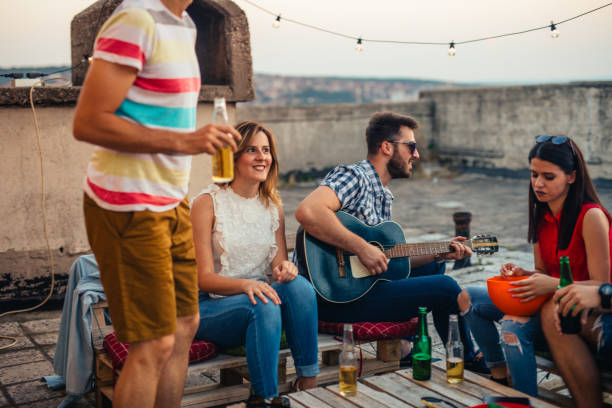istock Friends at rooftop party 826753782