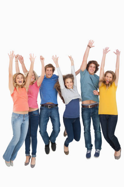 istock Celebrating friends jumping in the air 826756140