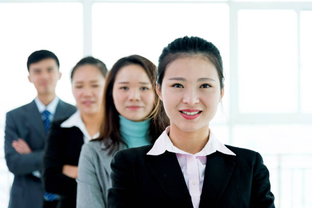 istock Group of businesspeople standing in a line 826756294