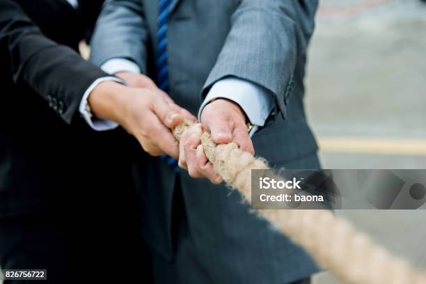 Business Competition Stock Photo - Download Image Now - Rope, Pulling, Teamwork