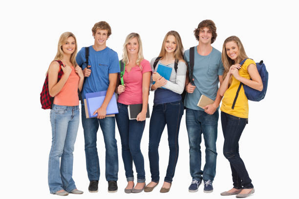 istock Smiling students wearing backpacks and holding books in their hands 826756744