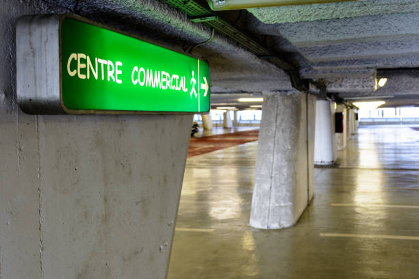 istock Luminous signs in an underground parking lot 826763280
