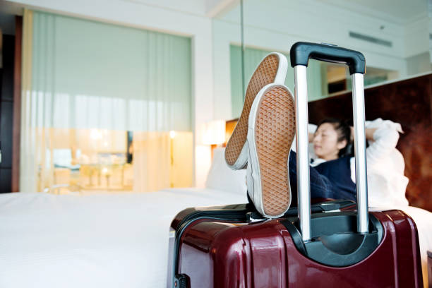 istock Young woman resting at hotel room 826766412