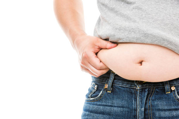 gordura barriga masculina - overweight dieting men unhealthy eating - fotografias e filmes do acervo