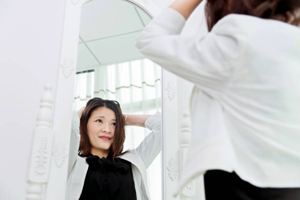 istock Tired businesswoman looking at herself 826771526