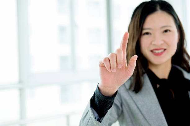 istock Businesswoman touching something on screen 826771804