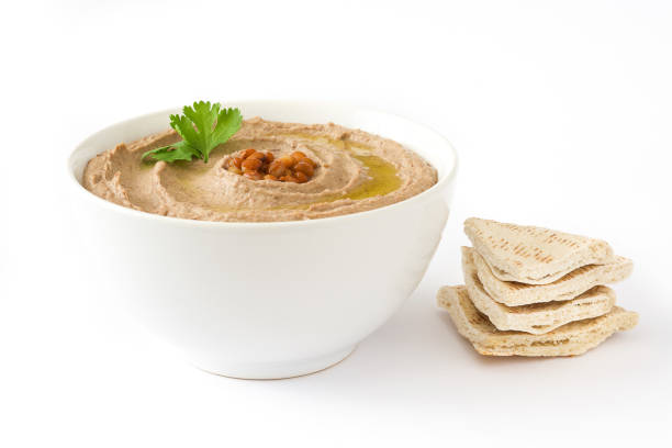 Lentil hummus Lentil hummus isolated on white background hummus stock pictures, royalty-free photos & images