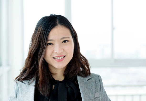 istock Young businesswoman in modern office 826775056