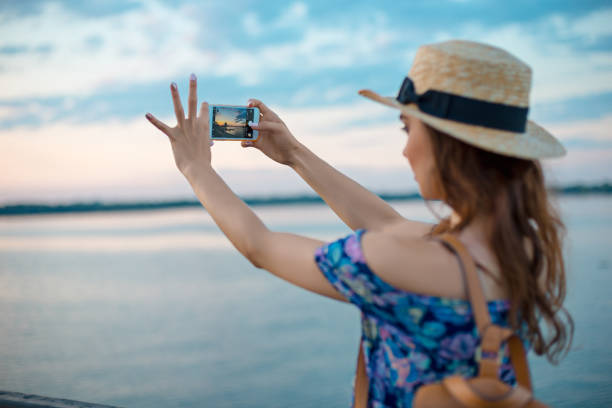 istock Young woman and river at city 826777854