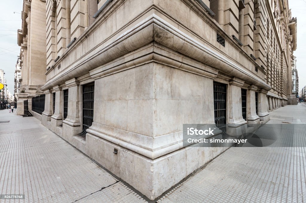 Angle of the corner of a neoclassical building with both sidewalks Corner Stock Photo