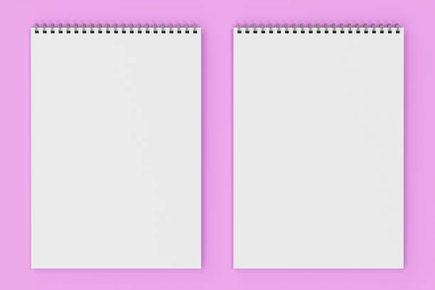 istock Blank white notebook with metal spiral bound on violet background 826781958