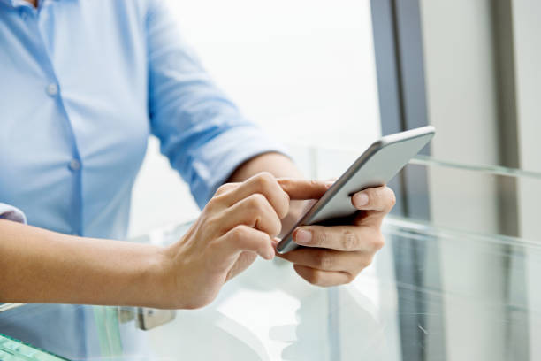 istock Businesswoman with smartphone 826785346