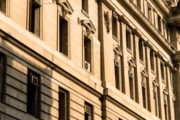 istock Exterior with windows of a neoclassical building during sunset 826791876