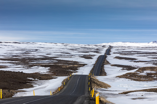 Typical Iceland landscape with road and mountains.