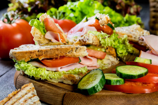 istock Panini sandwich with ham, tomato and lettuce. 826796062