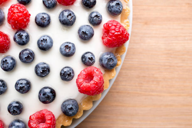 istock Cake with blueberries and raspberries. Confectionery product. 826803500