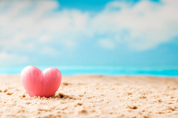 istock Heart on the sand on the seashore. 826806100
