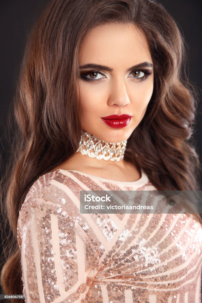 Elegant Fashion Brunette Woman Portrait Wavy Hair Style Red Lips Makeup Healthy Shiny Hairstyle Sexy Girl Model In Sequin Dress Isolated On Black Background Stock Photo - Download Image Now - iStock Elegant Fashion Brunette Woman Portrait Wavy Hair Style Red Lips Makeup Healthy Shiny Hairstyle Sexy Girl Model In Sequin Dress Isolated On Black Background Stock Photo - Download Image Now - iStock