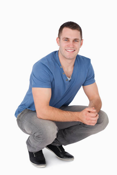 istock Portrait of a man squatting 826823978